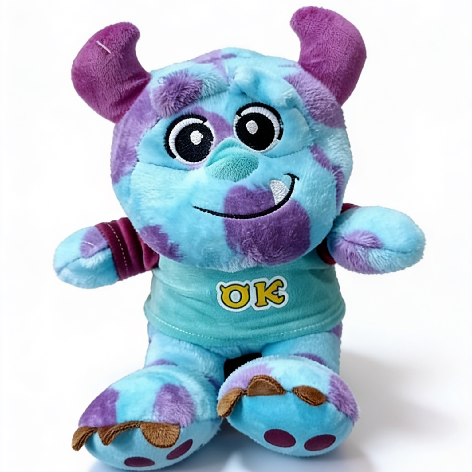PELUCHE SULLIVAN BEBE CON CAMISA 24 CM IMPORTADO