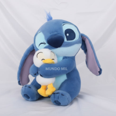 PELUCHE STITCH CON PATO 40 CM CON COBIJA COLORES IMPORTADO